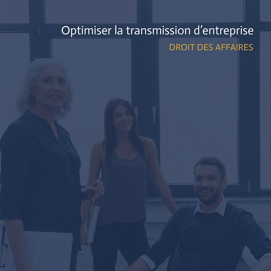 Trois personnes dans un cadre professionnel, représentant plusieurs générations au sein d’une entreprise familiale.